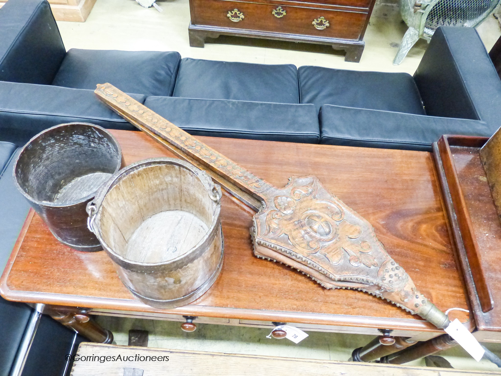 A 19th century coopered cast iron and ash bushel measure, a brass-bound ash gallon measure and a pair of Victorian oak and brass long-handled bellows